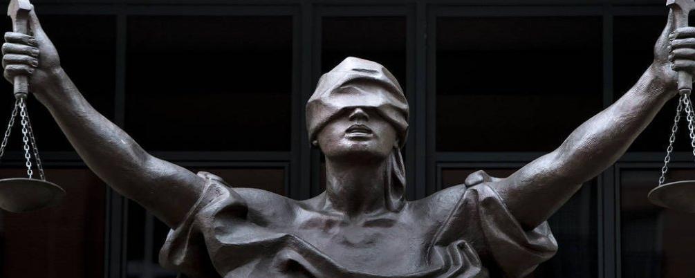 La réforme de la Justice est censée la simplifier mais certains craignent une perte d'accès au droit. © Brendan Smialowski / AFP/Archives